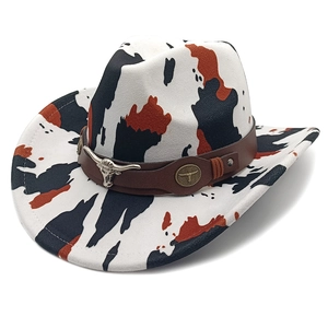 Vintage western cow print cowboy hat with wide brim and silver bull head emblem decoration