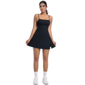 Detail of black sports dress featuring side slit and built-in safety shorts for tennis