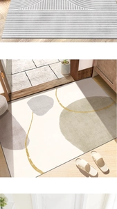 Macro detail of abstract beige grey rug with gold lines and modern hallway floor mat