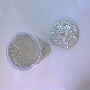 Macro detail of a 500ml double-wall straw cup decorated with sparkling rhinestones