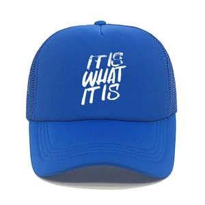 Royal blue mesh trucker hat with white IT IS WHAT IT IS slogan and curved brim