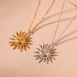 Minimalist sun face pendant necklace set in polished gold and silver stainless steel