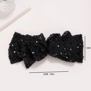 Black sequin oversized bow hair clip measuring 30cm by 13cm for elegant hair styling