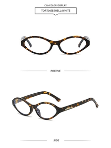 Detail view of retro tortoiseshell oval sunglasses with gold metal temple accents