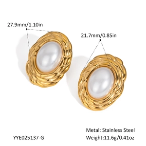 Detail view of oval pearl earrings with gold stainless steel frame and measurements