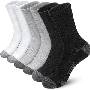 Close-up of 6 pairs of breathable basketball crew socks in white, grey, and black