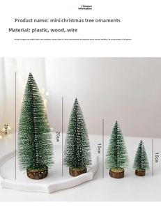 Detailed view of mini snow-flocked Christmas trees in 10cm to 25cm sizes with wood base