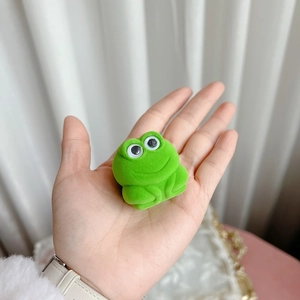 Cute green frog velvet jewelry box for rings and necklaces held in hand