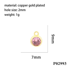 Detail view of pink zircon pendant in gold-plated copper with size and hole measurements