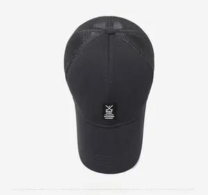 Top view of black mesh baseball cap showing breathable texture and GOLF fabric patch