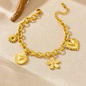 Gold plated stainless steel chunky chain bracelet with four textured floral heart charms