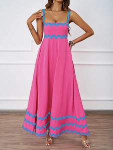 Detail of rose pink summer maxi dress with light blue wavy trim and cami straps