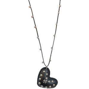 Gothic leather heart necklace with silver cross pendant and rivet accents on white background