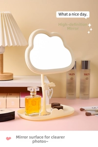 Cloud-shaped makeup mirror with a jewelry tray and hook in soft cream yellow