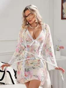 Close-up of yellow floral mesh nightgown with delicate white lace trim and robe detail