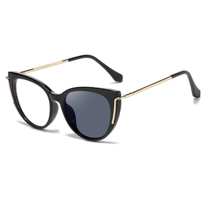2025 trendy cat eye photochromic glasses with black frames and gold metal temples