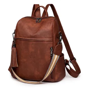 Retro brown faux leather backpack for women with striped strap and tassel detail