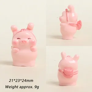 Detailed macro view showing three-sided layout of 3D resin pig with schoolbag