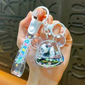 Cute cartoon panda liquid quicksand keychain charm in a bear-shaped clear casing