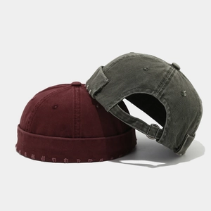 Bonnets docker en coton délavé vintage avec bord usé et boucle métallique réglable