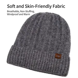 Men's grey ribbed knit beanie with warm fleece lining and snowflake leather patch