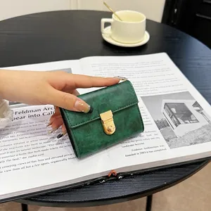 Vintage dark green mini card holder wallet for women with golden twist lock closure