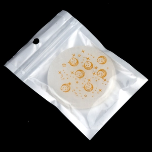 Round white crystal energy stone featuring golden tree of life and moon star engraving