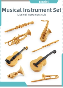 Miniature musical instrument set with tiny saxophone, violin, and guitar models
