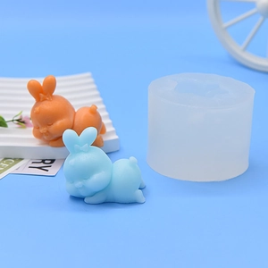 Hasen-Silikonform für Kerzen mit schlafenden Kaninchenfiguren und Zierschleifen