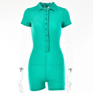 Close-up of green sequin playsuit with button-front detail and lapel collar design