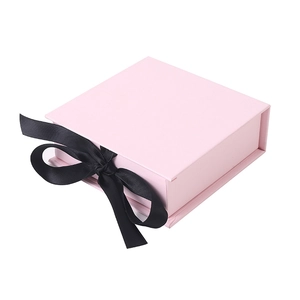 Elegant pink ribbon gift box for jewelry packaging with black satin bow and magnetic flap