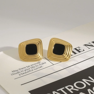 French vintage style square gold earrings with black resin inlay and textured finish
