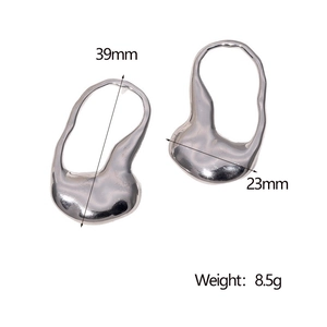 Detailed view of silver irregular stainless steel earrings with size 39mm and 8.5g weight