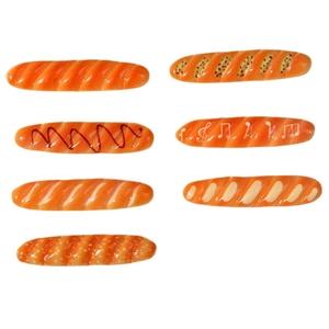 Lot de 7 mini-barrettes baguette en résine jaune-orange avec une finition texturée brillante