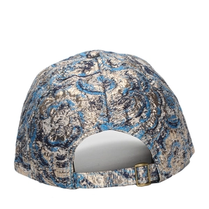 Blue and gold floral jacquard baseball cap featuring an adjustable antique bronze metal buckle