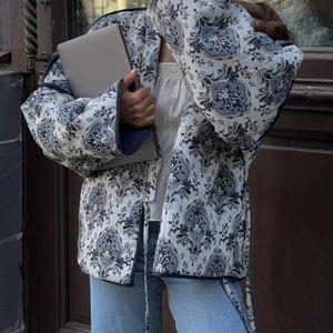 Navy blue paisley print quilted cotton jacket with vintage V-neck and waist ties