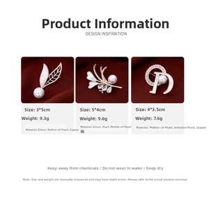 Detailed view of three 14K gold-plated pearl brooches on premium red silk background