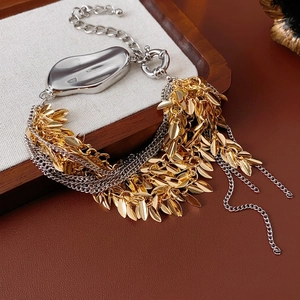 Multi-layered irregular tassel bracelet with wheat spike charms and metallic fringe