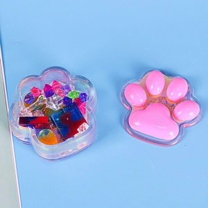 Iridescent cat paw jewelry box with pink paw pad lid and colorful resin fillers