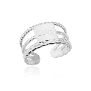 Detail of layered silver ring featuring beaded texture and engraved LOVE plaque