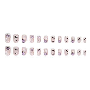 Short round Halloween press-on nails with cute pumpkin, ghost, and bat patterns