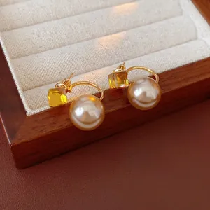 French vintage gold earrings with round white pearl and amber cube gemstone