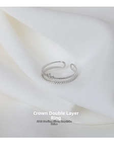 Detailed shot of double-layer S925 sterling silver crown ring with cubic zirconia