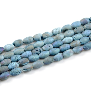 Macro detail of natural light blue geode agate oval beads for DIY jewelry making