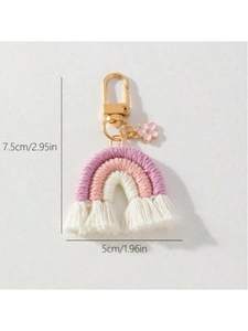 Detailed size view of handmade woven rainbow keychain with pink flower pendant