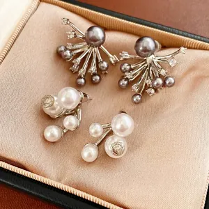 Elegant silver branch flower and pearl earrings with firework zircon stud design