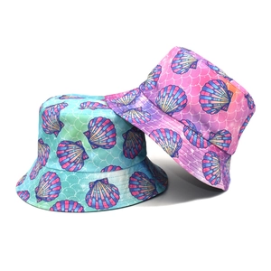 Reversible bucket hat for women with colorful ocean shell patterns and wave textures