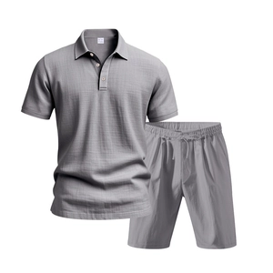 Detailed texture of grey linen fabric on men's summer short sleeve polo and shorts set