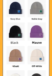Selection of knit beanies in six colors featuring the N letter patch on the folded cuff