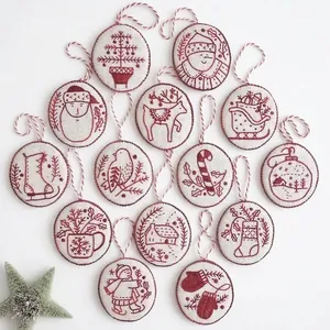 Set of 14 Jolly and Bright handmade embroidered Christmas tree ornaments with festive designs